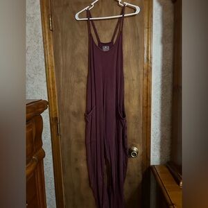 Free People Hot Shot Onesie
Size Medium 
Color Burgundy